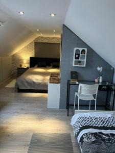 Postel nebo postele na pokoji v ubytování Le Flanelmont