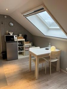 Kuchyň nebo kuchyňský kout v ubytování Le Flanelmont