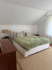 Ένα ή περισσότερα κρεβάτια σε δωμάτιο στο Landhaus Baptist