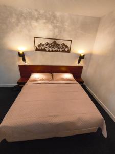 Ένα ή περισσότερα κρεβάτια σε δωμάτιο στο Apartmán Eli Veľká Lomnica Tatragolf +48 φωτογραφίες