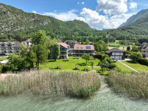 an aerial view of a resort in the mountains at Villa Caroline, Lac d'Annecy in Duingt