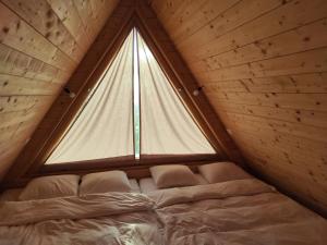 Ένα ή περισσότερα κρεβάτια σε δωμάτιο στο Glamp Pr Kuzuc