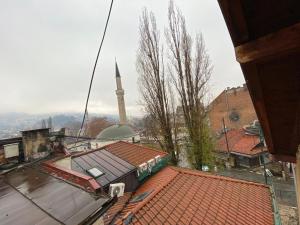 a view of a mosque from the roof of a building at Rejhan in Sarajevo