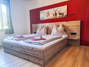 En eller flere senge i et værelse på Apartment Appartement 2 by Interhome