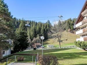 a view of a park with a chair lift at Apartment Curnera 9-4 by Interhome in Laax-Murschetg