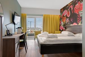 Μια τηλεόραση ή/και κέντρο ψυχαγωγίας στο Thon Partner Hotel Saga