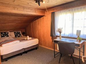 Postel nebo postele na pokoji v ubytování Apartment Adlerhorst-Stube by Interhome