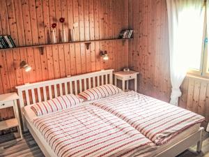 Ένα ή περισσότερα κρεβάτια σε δωμάτιο στο Holiday Home Ferienhaus Licht by Interhome