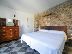 Ένα ή περισσότερα κρεβάτια σε δωμάτιο στο Holiday Home Peral by Interhome