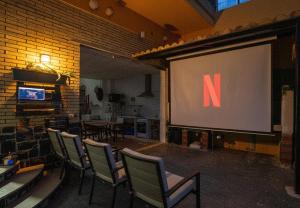 Μια τηλεόραση ή/και κέντρο ψυχαγωγίας στο Villa Naranjos - Sauna - Jacuzzi - Gym - BBQ