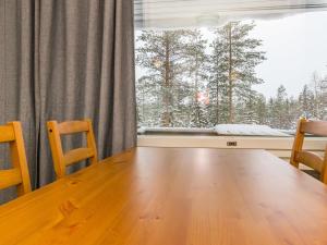 Το Holiday Home Kotipaljakka a3 by Interhome τον χειμώνα