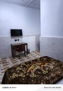 Μια τηλεόραση ή/και κέντρο ψυχαγωγίας στο UniZone Guest House +8 φωτογραφίες