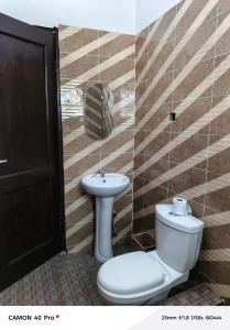 Ένα μπάνιο στο UniZone Guest House