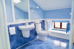 Ванная комната в Casa Los Lomas