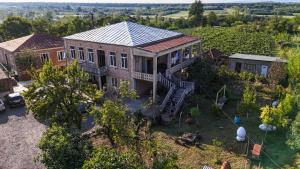 an aerial view of a house with a garden at Baias Wine in Bagdatʼi