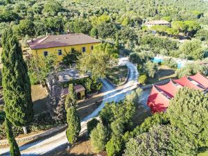 an aerial view of a house with a road and trees at Apartment Iris by Interhome in Venturina Terme