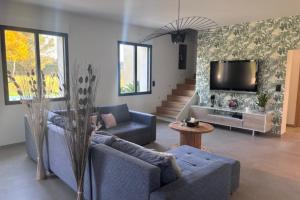 Χώρος καθιστικού στο Maison contemporaine - grand jardin et piscine privée +21 φωτογραφίες