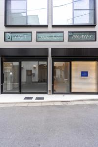 a facade of a building with many windows at AMBLE Asakusa in Tokyo +69 photos
