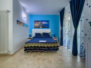 Postel nebo postele na pokoji v ubytování Agriturismo La Collina Verde + 122 fotografií