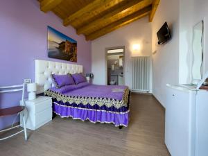 TV a/nebo společenská místnost v ubytování Agriturismo La Collina Verde