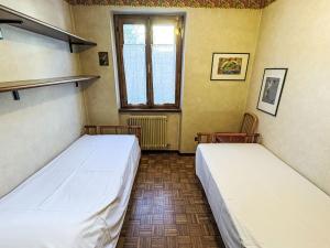 Una cama o camas en una habitación de Apartment Garlassi by Interhome