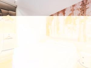 Et badeværelse på Apartment Dolores-3 by Interhome