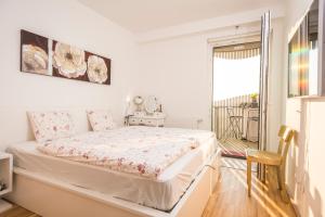 Postel nebo postele na pokoji v ubytování Sky View Apartment Vienna