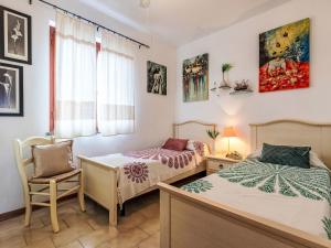 En eller flere senge i et værelse på Holiday Home Lo Scrigno Segreto by Interhome