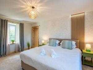 Ένα ή περισσότερα κρεβάτια σε δωμάτιο στο Holiday Home Cooriedoon by Interhome