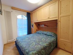 Una cama o camas en una habitación de Apartment Appartamento Ghezzi by Interhome