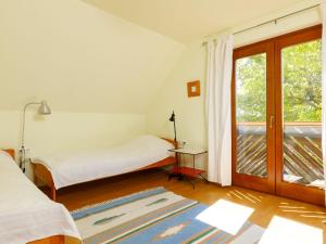 Ένα ή περισσότερα κρεβάτια σε δωμάτιο στο Apartment Nadori 2 by Interhome