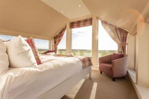 En eller flere senge i et værelse på Blacklaws Farmhouse - Blacklaws Steading