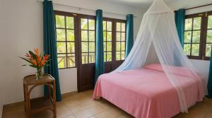 Ένα ή περισσότερα κρεβάτια σε δωμάτιο στο Villa Solazur