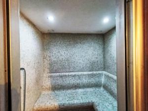 Phòng tắm tại Chalet Maset Pozzati by Interhome