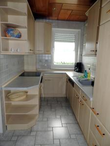 Kuchyň nebo kuchyňský kout v ubytování Gästehaus Am Hirtenberg + 37 fotografií