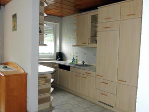 Kuchyň nebo kuchyňský kout v ubytování Gästehaus Am Hirtenberg