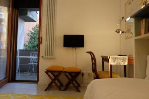 TV a/nebo společenská místnost v ubytování Milano B&B