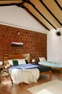 Postel nebo postele na pokoji v ubytování Nila by Raho - Secluded Villa with Estate View