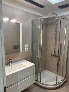 Ванная комната в Manga Luxury Apartments - 2 Bedrooms +8 фотографий