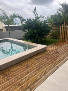 Bazén v ubytování Case Ylang Blossom maison neuve avec piscine nebo v jeho okolí