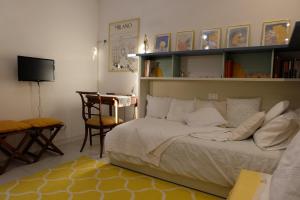 Postel nebo postele na pokoji v ubytování Milano B&B