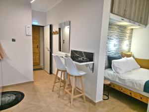 Ένα ή περισσότερα κρεβάτια σε δωμάτιο στο Andri Studio