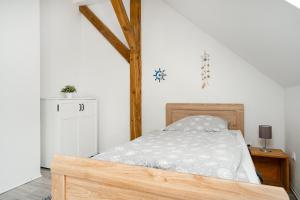 Postel nebo postele na pokoji v ubytování Alte Pastorei Wiefels