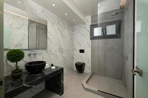 Et badeværelse på Mitos Ultimate Escape Villas