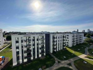 an aerial view of a large apartment building at New luxury modern Apartment in Šnipiškės in Vilnius