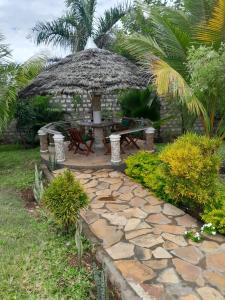 Κήπος έξω από το Chero-Palms