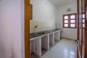 Kuchyň nebo kuchyňský kout v ubytování Hotel Bhakti Dhama