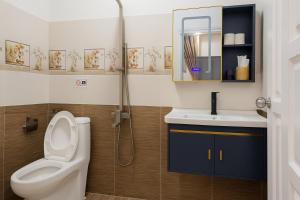 Koupelna v ubytování Thu Hiền hotel Gần Chợ có Máy Chiếu + 33 fotografií