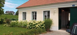 Un jardín fuera de Family Apartment - Ferienwohnumg im Südburgenland