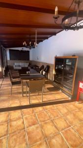 a dining room with a table and chairs at Villa Familia in Écija